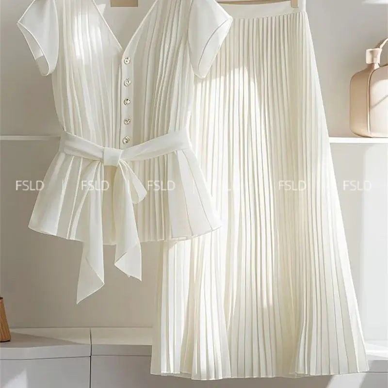 Sophisticated Summer Ensemble: Lace-Up Blouse & Pleated Skirt Set